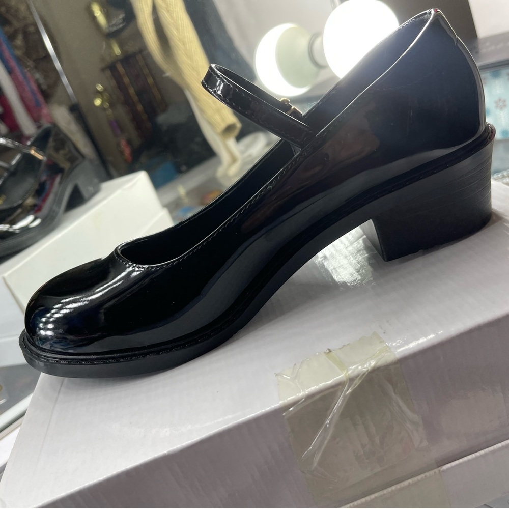Black vintage Mary Jane shoes with a small heel